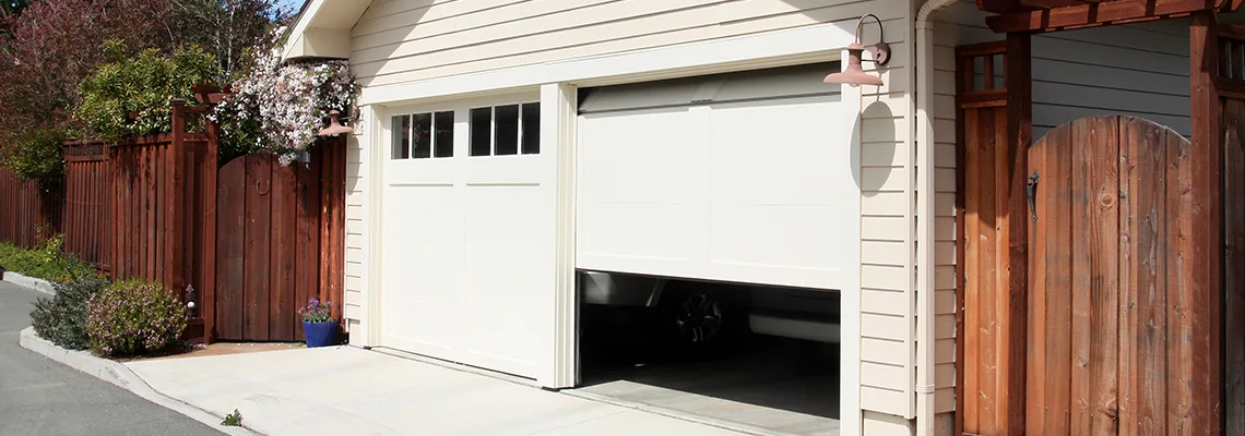 Fix Metal Garage Door Jerking in Glenview, Illinois